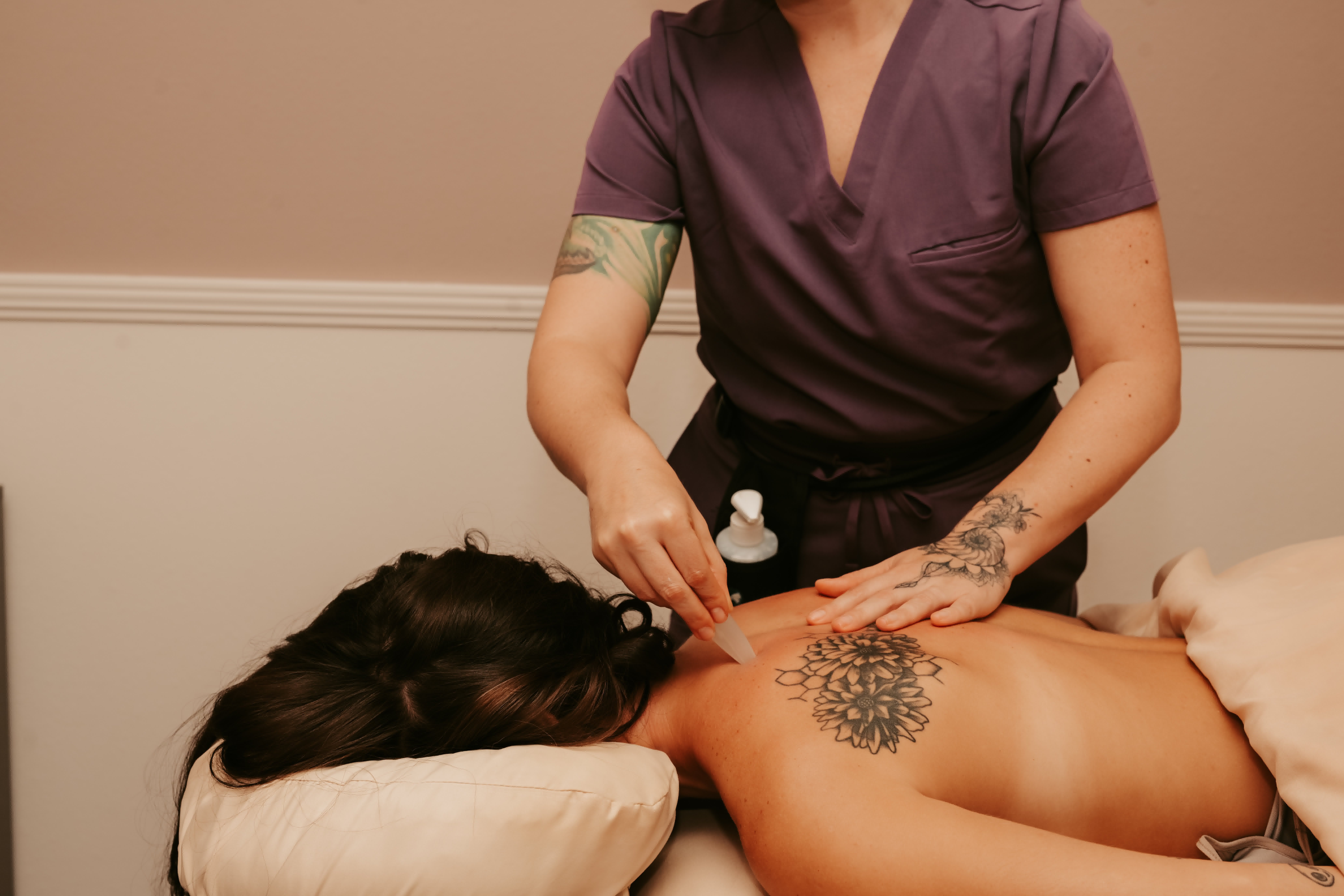 Client experiencing intuitive massage therapy session