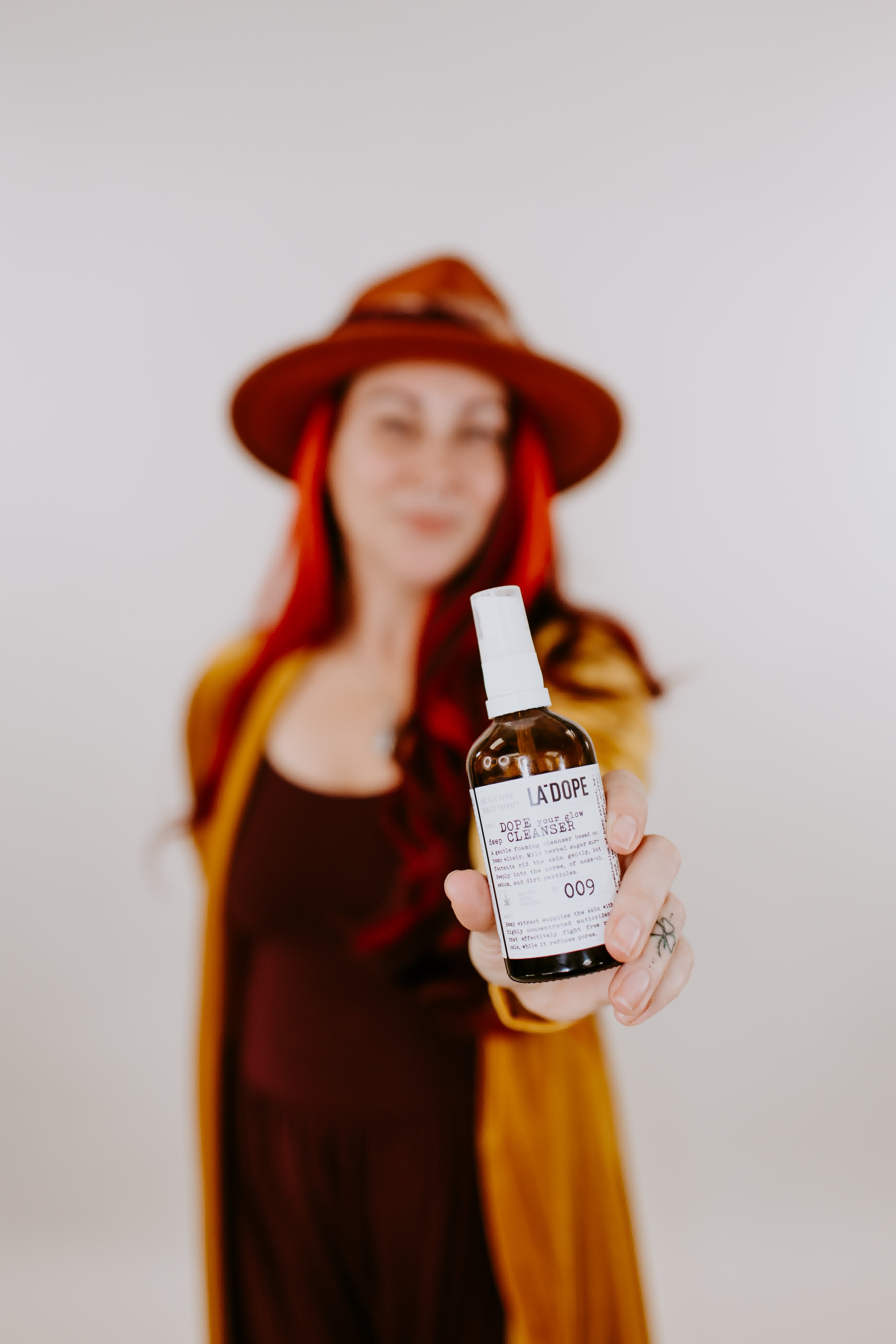 Krysta Smith with Olive Tree People waterless skincare products